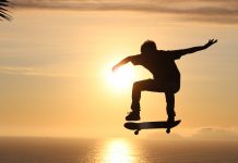 Why Do They Love Skateboarding? silhouette of man jumping on mid air during sunset