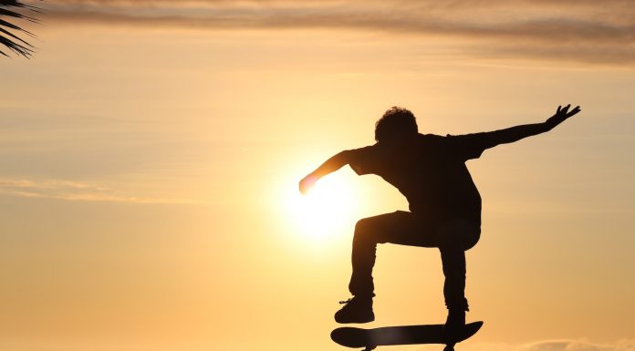 Why Do They Love Skateboarding? silhouette of man jumping on mid air during sunset