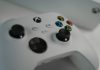 Exploring the Nostalgic World: Built-in Games Consoles and Retro Console a white video game controller