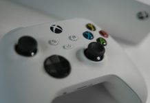 Exploring the Nostalgic World: Built-in Games Consoles and Retro Console a white video game controller