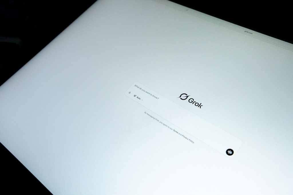 Close-up of a laptop screen with a logo