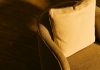 Designing Comfortable Spaces for Home and Work a close up of a cushion on a chair
