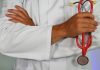 Balanced Living for Go Getters of Today doctor holding red stethoscope